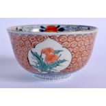 A SMALL 18TH CENTURY JAPANESE EDO PERIOD IMARI BOWL painted with floral sprays. 12 cm diameter.