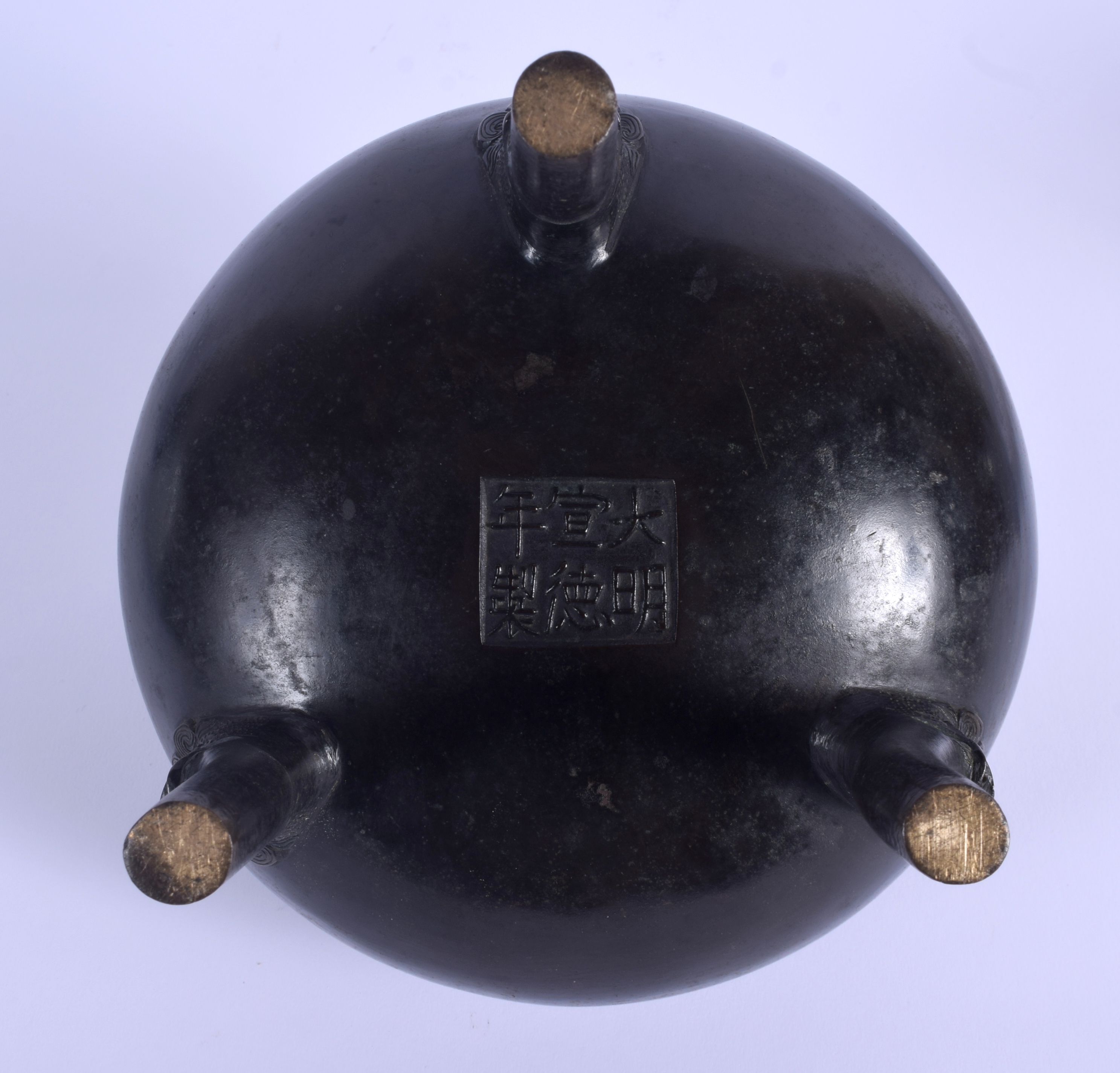 A 19TH CENTURY CHINESE TWIN HANDLED BRONZE CENSER Qing, bearing Xuande marks to base. 17 cm x 19 cm. - Image 6 of 7