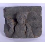 AN EARLY INDIAN CARVED SCHIST METAMORPHIC ROCK CARVING representing a buddhistic deity. 11 cm x 9 cm