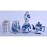 A 19TH CENTURY JAPANESE MEIJI PERIOD BLUE AND WHITE SAKE BOTTLE together with two others. Largest 22