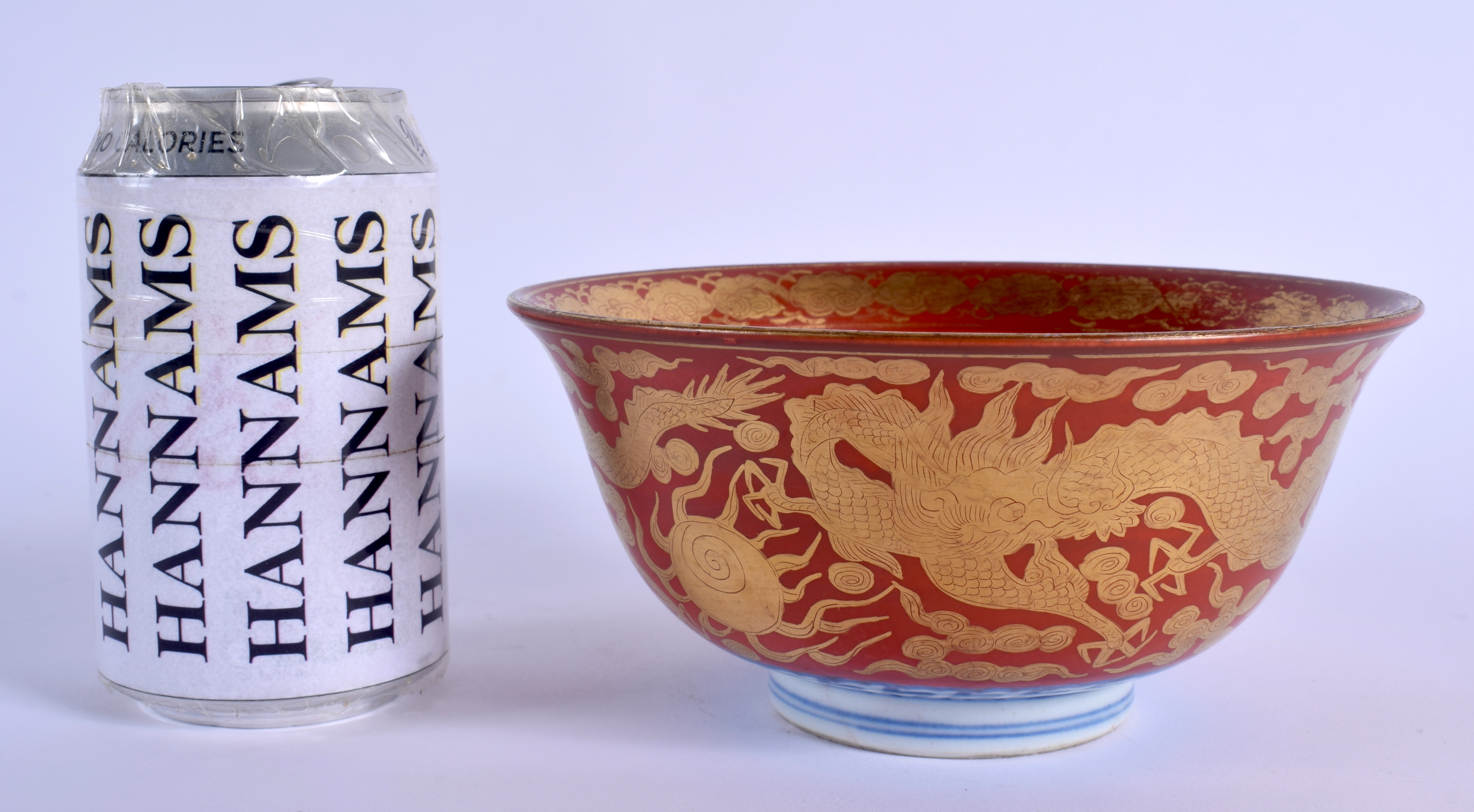 A 19TH CENTURY JAPANESE MEIJI PERIOD KUTANI PORCELAIN BOWL painted upon a coral ground with dragons. - Image 2 of 5