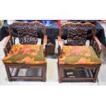 A LOVELY PAIR OF 19TH CENTURY CHINESE CARVED HONGMU HARDWOOD CHAIRS Qing, decorated with foliage and