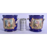 A PAIR OF 19TH CENTURY FRENCH SEVRES PORCELAIN CACHE POT painted with figures courting within landsc