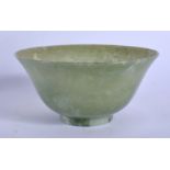 AN EARLY 20TH CENTURY CHINESE CARVED JADE BOWL Late Qing/Republic. 11.5 cm diameter.