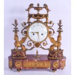 A LARGE EARLY 19TH CENTURY FRENCH BRONZE AND RED MARBLE MANTEL CLOCK the bold enamel dial painted wi
