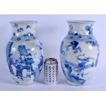 A LARGE PAIR OF 19TH CENTURY CHINESE BLUE AND WHITE PORCELAIN VASES Qing, bearing Kangxi marks to ba
