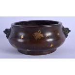 A CHINESE QING DYNASTY GOLD SPLASH BRONZE CENSER with Buddhistic lion handles. 15 cm wide, internal