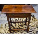 AN EARLY 18TH CENTURY FRUITWOOD SINGLE DRAWER TABLE with rectangular stretcher and brass drop handle