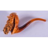 A 19TH CENTURY CARVED MEERSCHAUM AND AMBER PIPE formed as a bearded male. 11.5 cm wide.