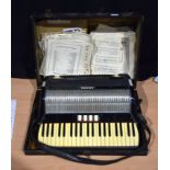 An Italian Feoro cased accordion 18 x 52cm (2).