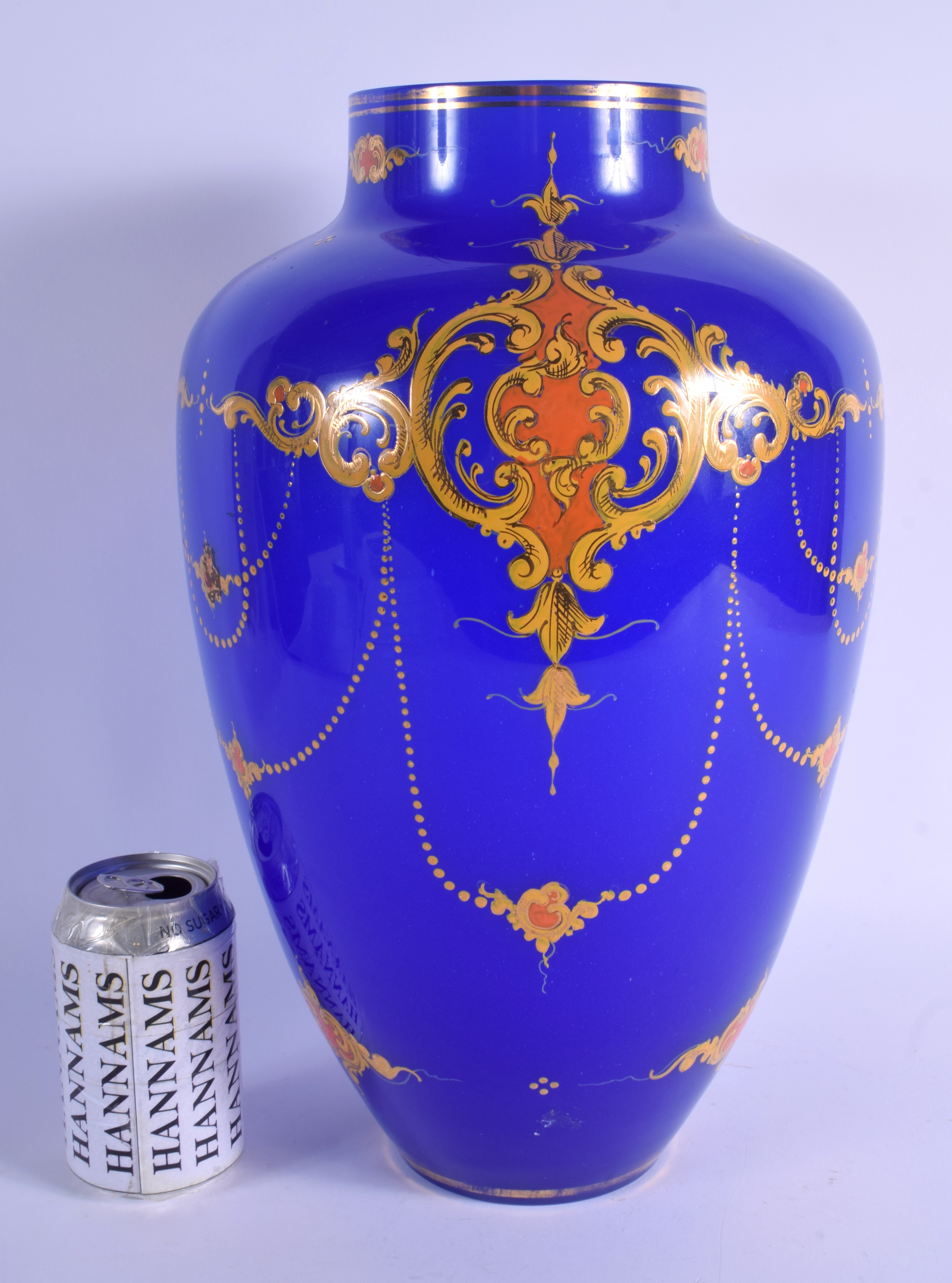 A LARGE TURKISH OTTOMAN BLUE GLASS VASE enamelled with motifs. 39 cm x 18 cm.