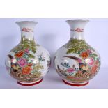 A PAIR JAPANESE TAISHO PERIOD BULBOUS PORCELAIN VASES decorated with birds. 27 cm high.