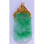 AN EARLY 20TH CENTURY CHINESE 18CT GOLD MOUNTED JADEITE PENDANT Late Qing/Republic. 5.5 cm x 3 cm.
