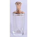 AN ANTIQUE GOLD MOUNTED SCENT BOTTLE. 10 cm high.