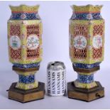 A PAIR OF 19TH CENTURY CHINESE FAMILLE ROSE RETICULATED LANTERNS Guangxu, converted to lamps. Porcel