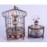 TWO AUTOMATON CLOCKS in the form of an aquarium and bird cage. Largest 17 cm x 12 cm. (2)
