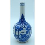 A Chinese blue and white porcelain vase decorated with foliage .Kangxi mark 28 x 13cm.
