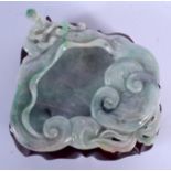 AN EARLY 20TH CENTURY CHINESE CARVED JADEITE BRUSH WASHER Late Qing/Republic, carved with chilong. 1