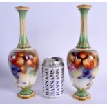 A ROYAL WORCESTER PAIR OF VASES painted with autumnal leaves and berries by May Blake, signed M. Bla