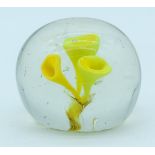 A Vintage Paperweight with a yellow trumpet swirl 6cm .