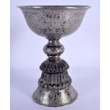 A 19TH CENTURY CHINESE TIBETAN SILVER STEM FORM LIBATION CUP decorated with flowers. 279 grams. 15.7