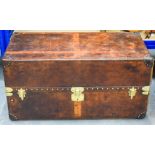 A FINE LARGE LOUIS VUITTON BROWN LEATHER TRUNK with bold brass mounts and locks. 110 cm x 56 cm x 56