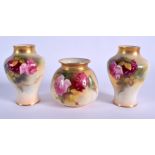 A ROYAL WORCESTER PAIR OF VASES painted with Hadley style roses shape 2491 date code for 1925 and a