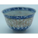 A small Chinese bowl decorated with phoenix and foliage 10 x 6cm.