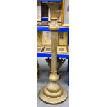 A VERY LARGE 19TH CENTURY ISLAMIC BRASS STANDING FLOOR LAMP inscribed with Kufic script. 160 cm high