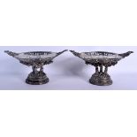 A PAIR OF 19TH CENTURY CHINESE EXPORT TWIN HANDLED SILVER TAZZA Attributed to Wang Hing, decorated w