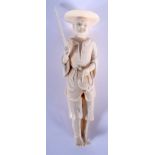 AN EARLY 20TH CENTURY CHINESE CARVED IVORY FIGURE OF A FISHERMAN modelled holding a fish. 18 cm high
