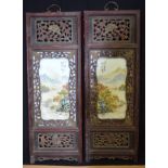 A framed pair of Republican period porcelain panels decorated with mountains 95 x 34cm(2)
