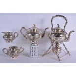 A 19TH CENTURY CHINESE EXPORT SILVER FOUR PIECE TEASET by Luenwo, decorated with flowers and vines.