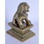 AN 18TH CENTURY CHINESE BRONZE FIGURE OF A BUDDHISTIC LION Qing. 11 cm x 7 cm.