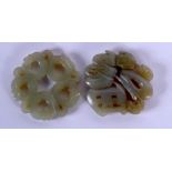 TWO EARLY 20TH CENTURY CHINESE CARVED JADE PLAQUES Late Qing. 5 cm diameter. (2)