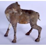 A CHINESE HAN DYNASTY POTTERY FIGURE OF A HORSE of unusual form. 27 cm x 23 cm.