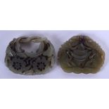 TWO EARLY 20TH CENTURY CHINESE CARVED JADE PLAQUES Late Qing. 5 cm diameter. (2)