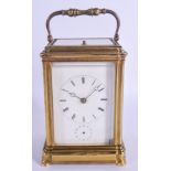 A 19TH CENTURY FRENCH GRAND SONNERIE REPEATING CARRIAGE CLOCK with white enamel dial. 18 cm high inc