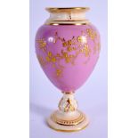 A ROYAL WORCESTER PEDESTAL VASE with rose pompadour ground gilded flowering trailing plants, shape 2