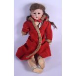 AN ADOLPH WISLZENUS BISQUE HEADED DOLL. 56 cm long.