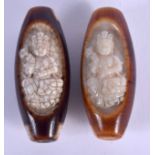 TWO CHINESE TIBETAN AGATE BEADS 20th Century. 5 cm long. (2)