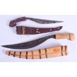 TWO CONTINENTAL WOOD CASED KNIVES. 40 cm long. (2)