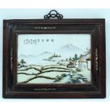 A Chinese framed porcelain panel decorated with a paddy field scene 24 x 36cm