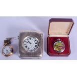 AN ANTIQUE SILVER CASED DESK CLOCK together with a Dan Dare watch etc. (3)