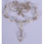 AN EDWARDIAN 9CT GOLD MOONSTONE NECKLACE. 8 grams. 46 cm long.