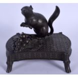 A 19TH CENTURY JAPANESE MEIJI PERIOD BRONZE RAT OKIMONO modelled upon a vine leaf. 14 cm x 12 cm.