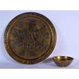 A MIDDLE EASTERN CAIRO WARE SILVER INLAID BRASS DISH together with a similar bowl. Largest 30 cm dia