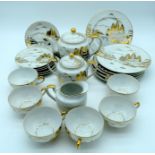 A Japanese Taisho period egg shell tea set with Geisha embossed in cups . (qty)