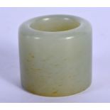A CHINESE CARVED GREEN JADE ARCHERS RING 20th Century. 3 cm wide.