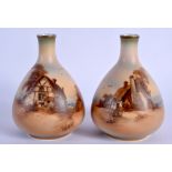 Royal Worcester fine and rare pair of vases painted in tones of browns and greens with cottage scene